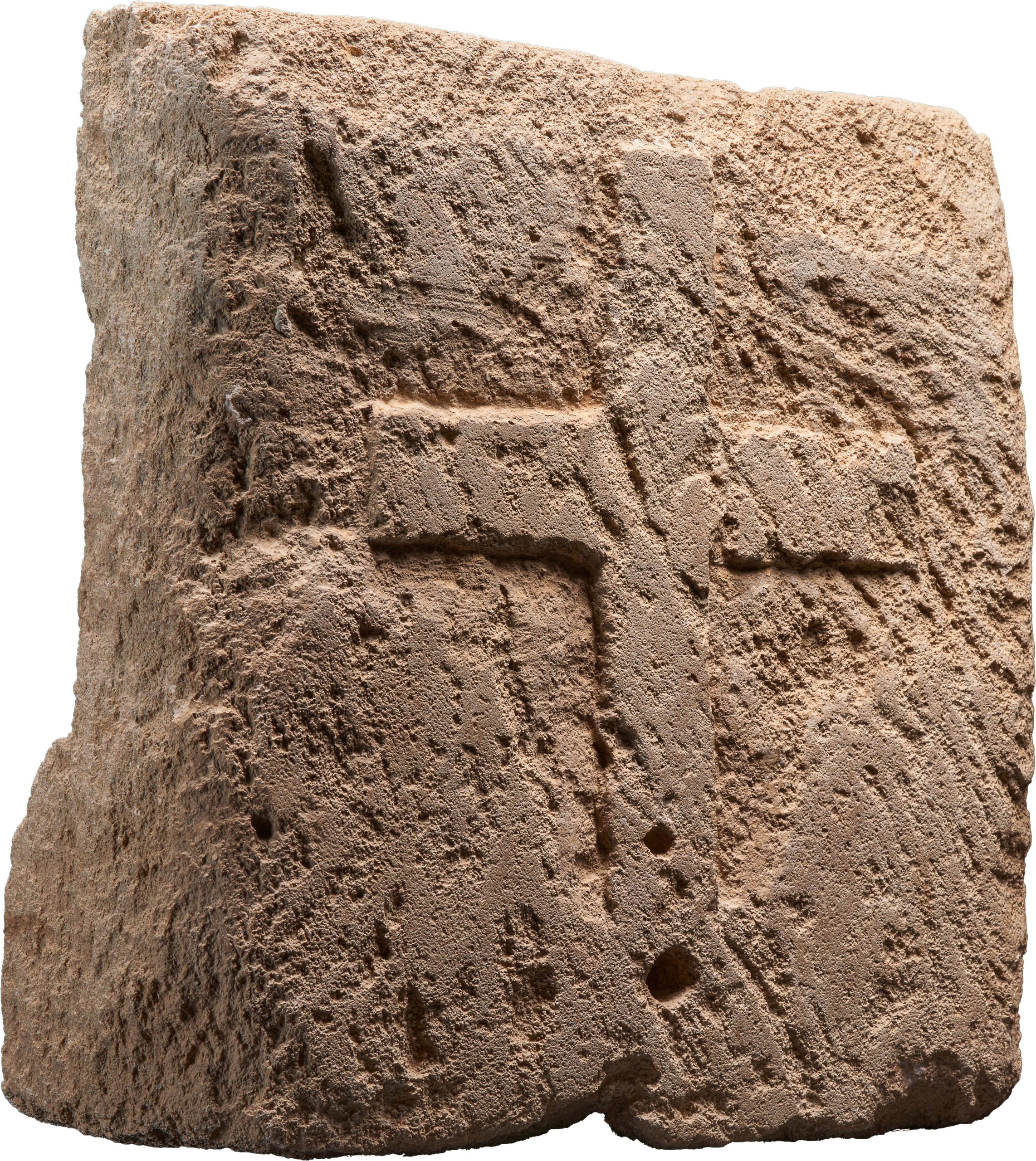 Cross carved on stone